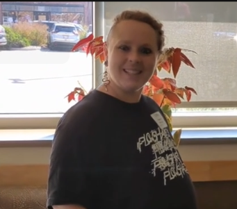 potter in front of window